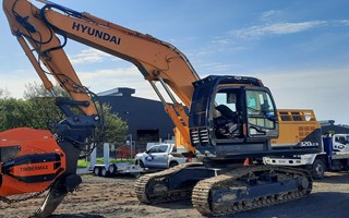 Hyundai LC 9 With Timbermax Sample Photo